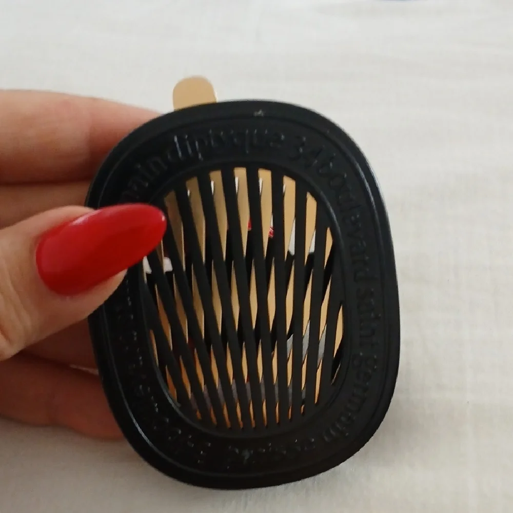 diptyque Black and Gold Oval Car Vent Diffuser - Picture 3 of 3